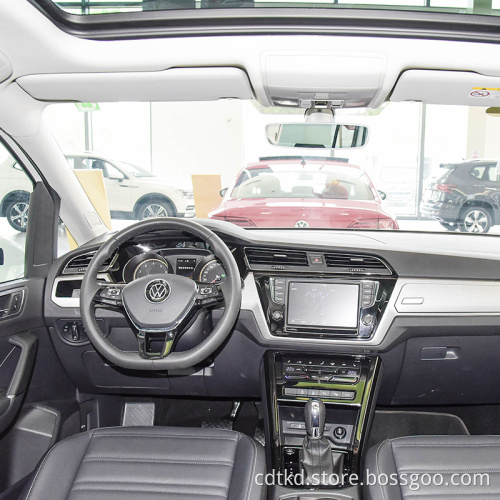 التصميم الصيني الجديد 0 كيلومتر استخدام سيارات توران MPV البنزين الفاخرة سيارات سيارات الدفع الرباعي عالية السرعة للبالغين الصين سيارة فولكس فاجن لأفضل بيع